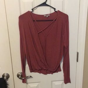 Low cut long sleeve top.